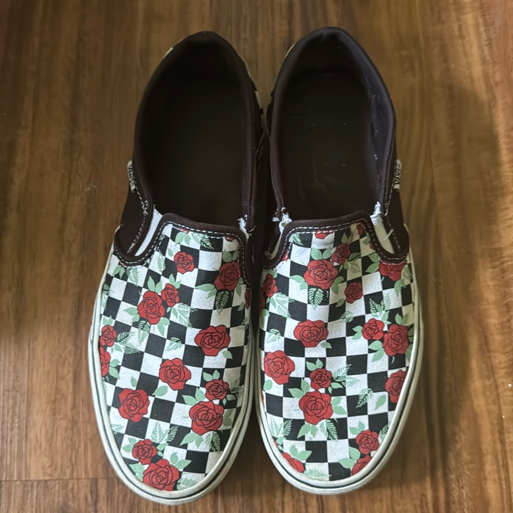 Checkered rose vans.